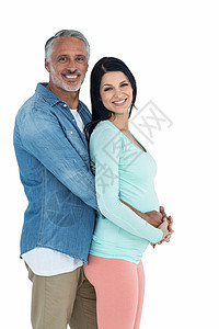 情侣相亲相拥的肖像怀孕女性孕妇装喜悦快乐保健恋人姿势分娩拥抱图片