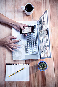 商务图表复合图像图集人士手机会计女性公司双手商业植物签名桌子图片