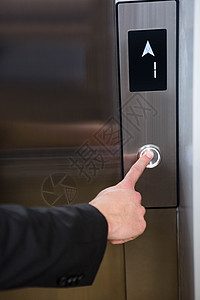 商务人士按电动电梯按钮公司职场技术金属不锈钢辅助功能控制面板人士管理人员图片