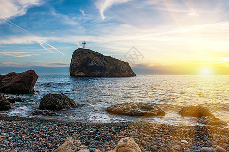 海滩日落蓝色反射岩石海景橙子支撑紫色地平线海岸戏剧性图片