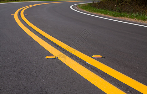 道路分隔线和标记黄色运输黑色线条交通安全边界车道路面条纹图片