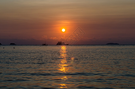 日落在海面上海洋晴天镜子天堂地平线蓝色海岸阳光太阳魔法图片