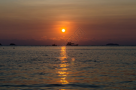 日落在海面上魔法镜子海洋海岸天堂戏剧性海岸线晴天海浪太阳图片