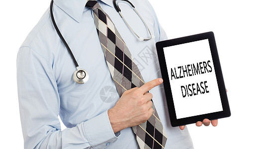 持有平板药的医生阿尔茨海默氏病药品考试程序蓝色诊断困惑监视器笔记本病人疾病图片