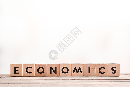 书桌上的经济学标志图片