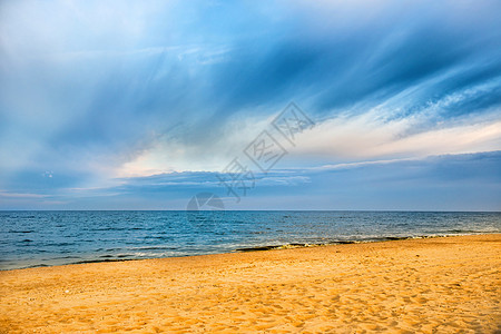 热带海滩和有波浪的蓝海日落阳光海景海岸线海浪支撑天堂天气太阳晴天图片