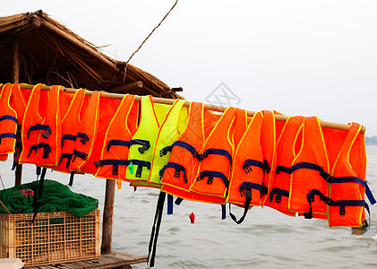 救生衣 救人一命天空游泳蓝色橙子假期背心乐趣海滩帮助事故图片