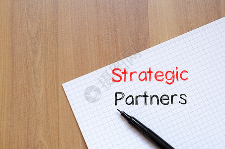 战略合作伙伴在noteboo上写字联盟成就协议创新谈判金融成功工作市场公司图片