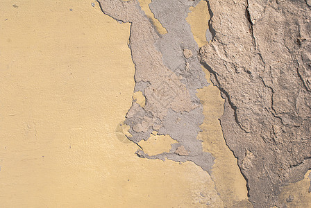 以裂缝和刮痕 风景风格 坚固的混凝土表面 大背景或纹理为温床水泥棕色建筑黄色褐色象牙珊瑚艺术建筑学风化图片