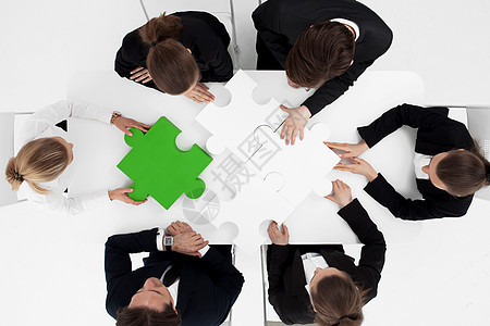 商界人士拼拼谜白色绿色拼图工作团队男人商业战略合伙女士图片