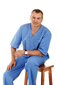一名年轻男医生在蓝色unifo外科手术中的肖像医院药品疾病微笑家庭援助心脏病兽医男人护理人员图片