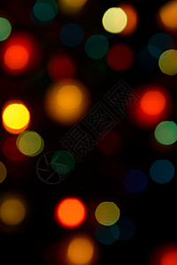 七彩散景灯辉光绿色闪光金子假期黄色派对红色背景圆圈图片