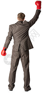 一名成功的商务人士的肖像男性套装工作管理人员手套运动商业胜利微笑男人图片