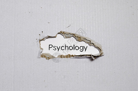 心理学这个词出现在撕破的纸后面沮丧研究精神头脑学习性格流程压力药品医生图片