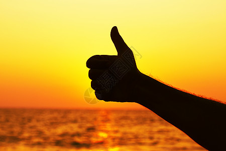 缩略图上手势日落拇指太阳假期天空男人标志优胜者手指图片
