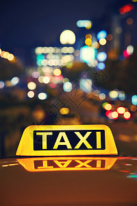 夜间出租车运输旅游方式商店大街商业驾驶房子交通场景图片