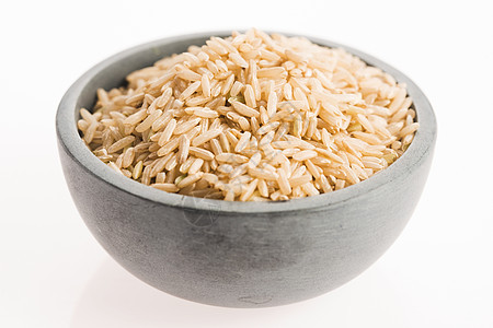 白背景孤立的碗里棕米饭饮食谷物团体粮食臀部木头食物图片