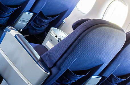 客舱的空旧飞机座椅 有选择性地集中教练商业客机椅子运输班级旅行皮革座位经济图片
