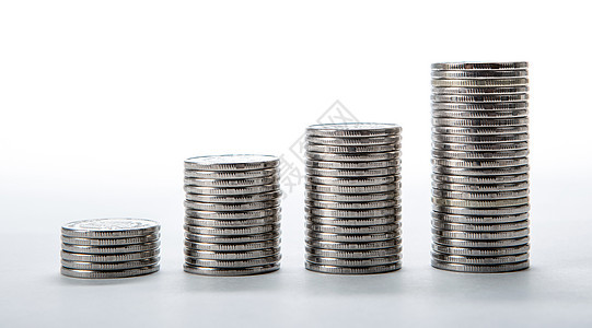 白背景上的硬币堆叠现金商业价格经济学积累投资储蓄经济数据收益图片