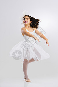 小芭蕾舞女乐趣身体工作室青年微笑童年芭蕾舞幸福女孩喜悦图片