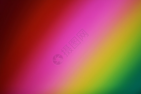 抽象纸堆离焦彩色背景折叠光谱团体海浪材料彩虹艺术红色绿色卷曲图片