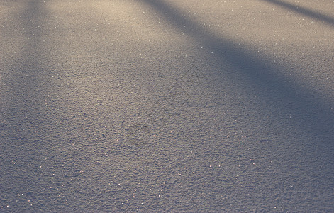 下雪背景 冬季阴影天气水晶寒意阳光晴天雪花季节火花新年图片