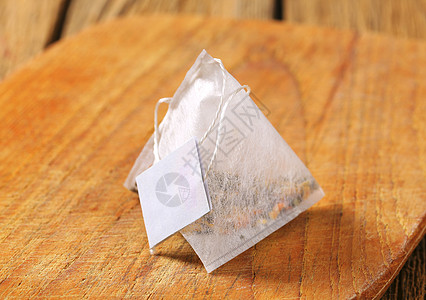 金字塔茶袋树叶木头小袋生物乡村绿茶图片