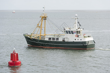 Wadden海上的渔船地平线阳光波浪全景驳船保护国家遗产连锁店血管图片