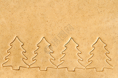 拿出被砍断的面粉 圣诞数字别针饼干烘烤香料星星烹饪刀具滚动木板厨房图片