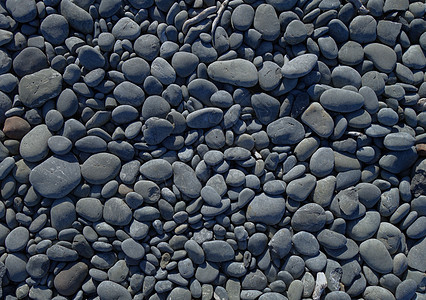 鹅卵石背景纹理碎石卵石海滩石头圆形白色矿物墙纸岩石材料图片
