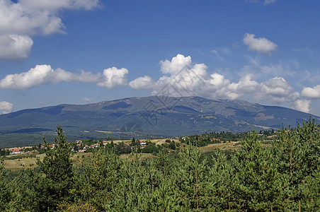 与Plana村一起预夏全景爬坡旅游岩石场地烟囱建筑学叶子房子村庄蓝色图片