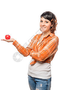 带着红苹果的快乐女孩 在白色背景上图片