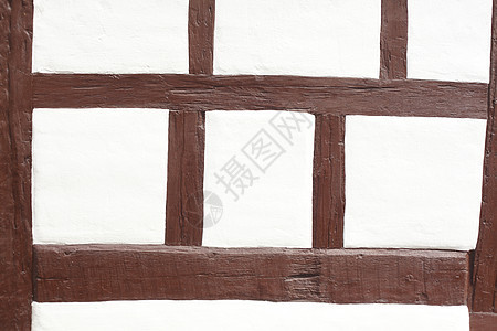 半缝墙壁房子木梁柠檬框架屋顶石头棕色横梁结构石墙图片