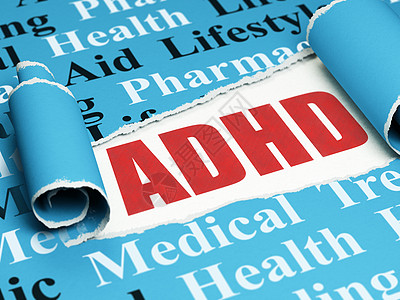 健康概念 红色文字 ADHD 在撕破纸下面图片