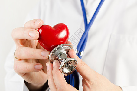 心脏病专家拿着心脏 3D 模式疾病压力诊所临床心脏病学医生情况诊断保健健康图片