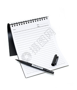 白色背景上孤立的笔记本学习金属软垫螺旋教育备忘录铅笔学校写作商业图片