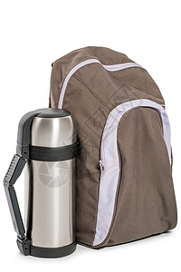 小背包和白色背景的热茶热水瓶是图片