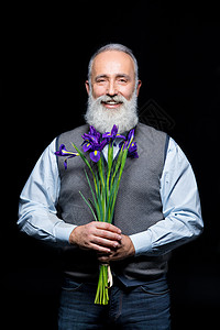 带鲜花的老人头发假期胡子虹膜幸福花束微笑植物群胡须男人图片