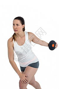 女性运动员在迪盘上玩曲棍球闲暇比赛活力金属铁饼活动耐力运动服运动专注图片