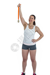 胜利后拥有金奖章的快乐女运动员荣誉能力金属微笑女士播放器锦标赛运动服丝带金牌图片