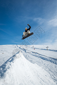 滑雪机跳过蓝天成人滑雪乐趣运动空气骑术娱乐便车单板岩石图片
