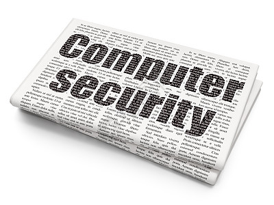 隐私权概念 报纸背景下的计算机安全;在报纸背景上图片