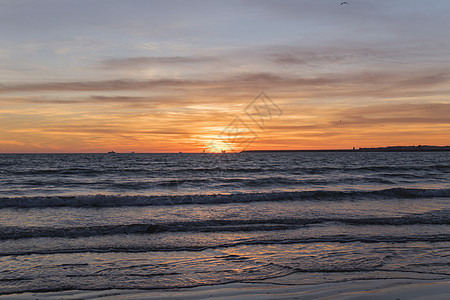 海滩上美丽的日落海景旅行海岸风景天际阳光天堂天空晴天太阳图片