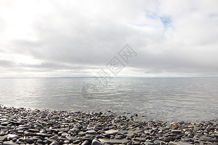 挪威北部的北极海滨支撑天气边缘海浪地平线阳光岩石风景海洋海景图片