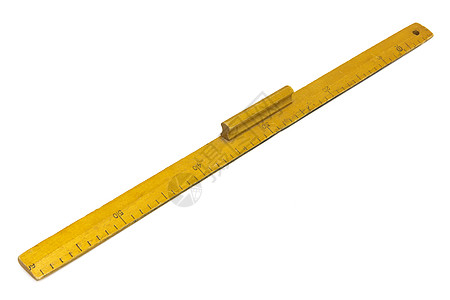 白色背景的黄色木制测量标尺图片
