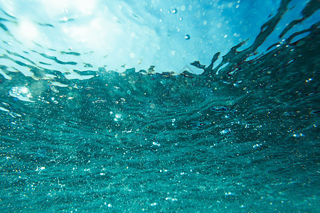 抽象的水下背景与博克阳光气泡水池海浪海洋游览液体潜水运动蓝色图片