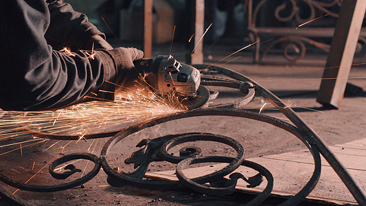 史密斯平滑金属板磨床工作职业背景金属铁匠铺手工马蹄铁匠工具深色图片