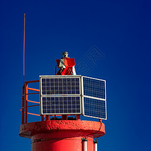 红灯塔对蓝天旅游灯塔灯光正方形海岸海景海洋蓝色旅行海岸线图片
