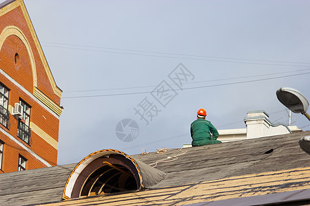 戴头盔的工人维修工匠气体劳动者修理承包商建筑学染色喷涂沥青图片