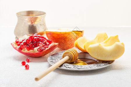 苹果园区的苹果 石榴和蜂蜜摄影想法节日水果北斗七星桌子饮食概念健康饮食甜食背景